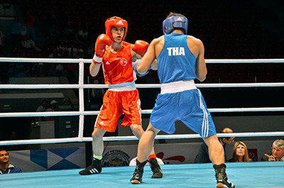 Amateur Boxers In Ring.
