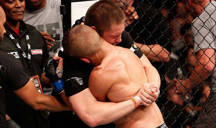 Tj Dillashaw And Duane Bang Ludwig Embracing In Octagon.