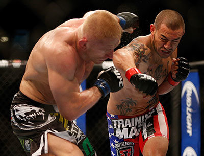 Cub Swanson Lands Punch Against Dennis Siver In The Ufc.