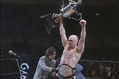 Bas Rutten Pancrase Fighting Champion With Trophy.