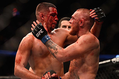 Nate Diaz And Conor Mcgregor Embrace Following Their War Ufc 202.