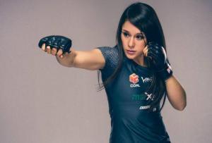 Alexa Grasso Throws A Punch For Camera.