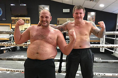 An Overweight Tyson Fury Poses With Ricky Hatton.