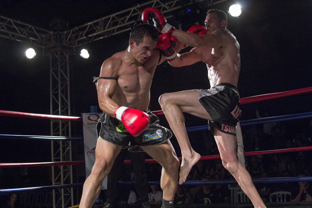 Two Muay Thai Fighters In The Ring Fighting.