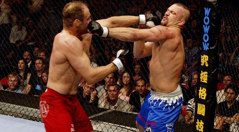 Randy Couture And Chuck Liddell Fighting At Ufc 43.